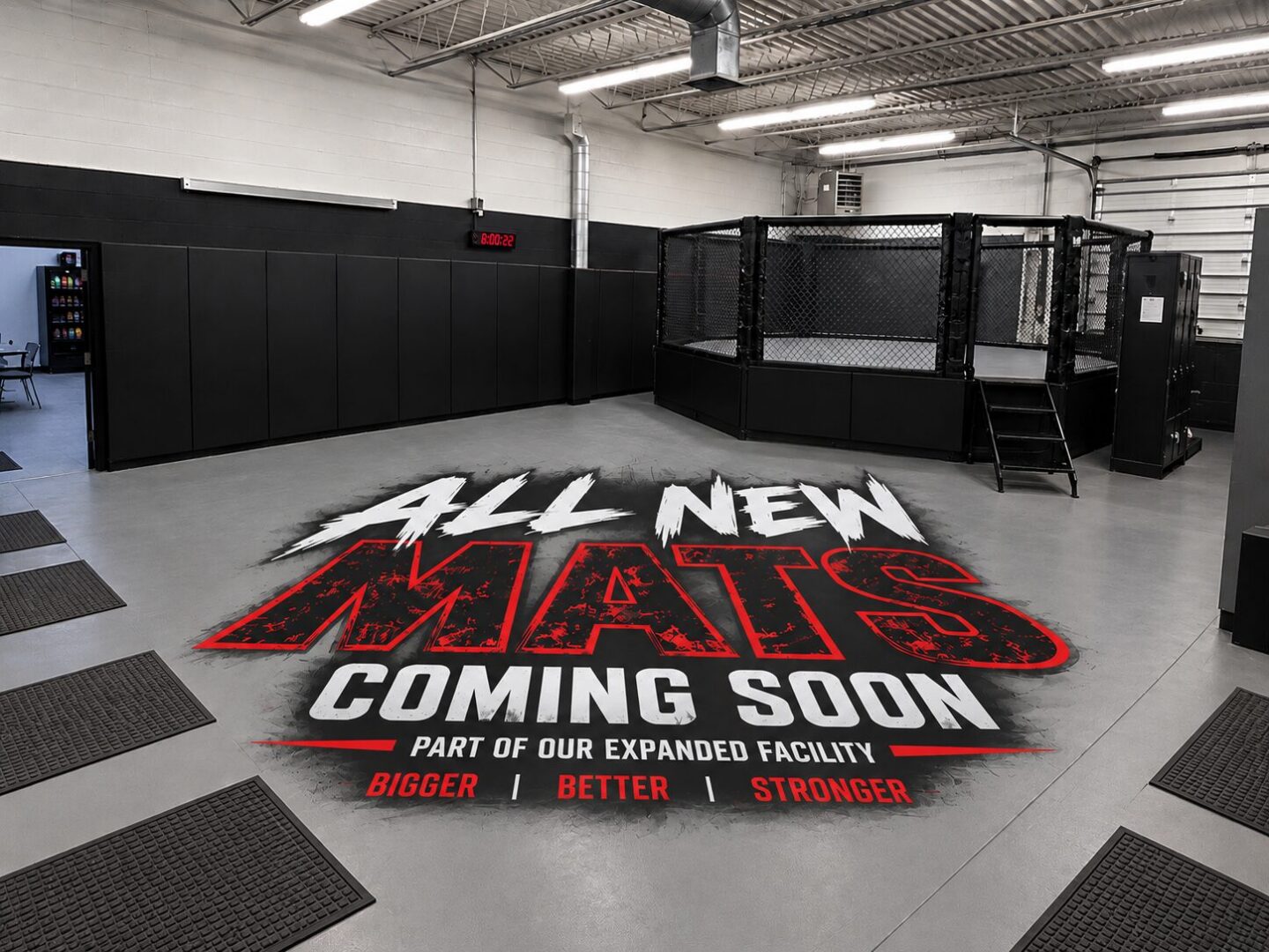 Gym with a wall in the background, a ceiling with lights at the top, and a floor